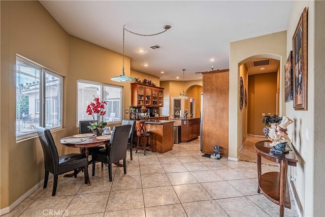 view of tiled dining space