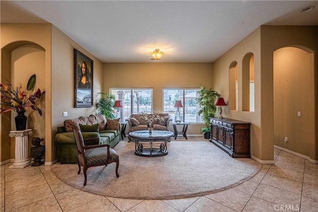 living room with light tile patterned floors