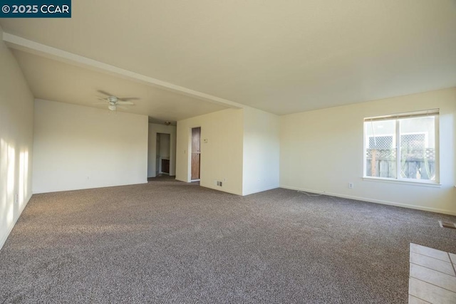 empty room with carpet flooring and ceiling fan