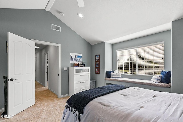 carpeted bedroom with ceiling fan and lofted ceiling