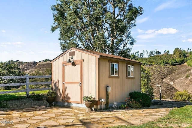 view of outdoor structure featuring a mountain view