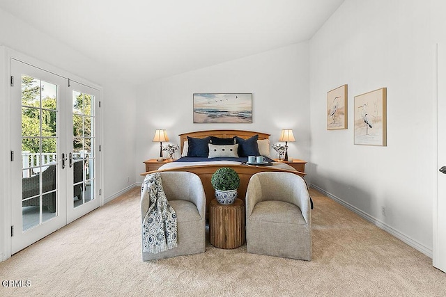 carpeted bedroom featuring french doors, lofted ceiling, and access to outside