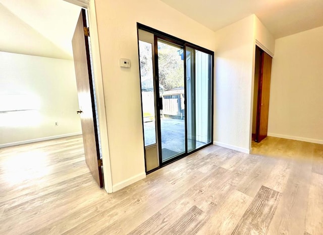 empty room featuring light hardwood / wood-style floors