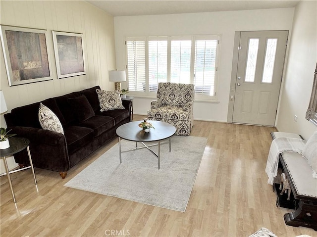 living room with light hardwood / wood-style floors