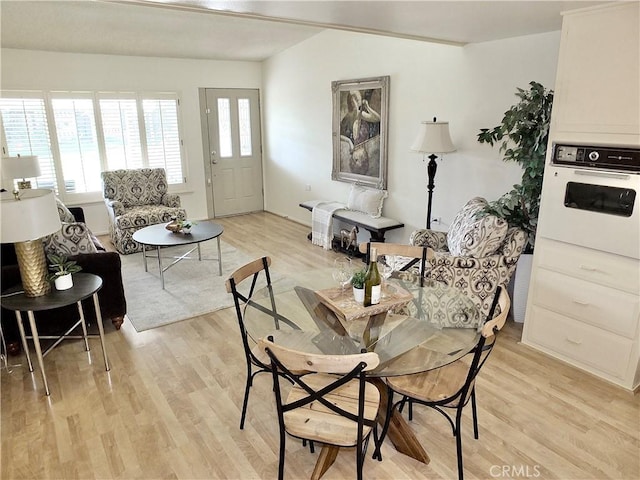 dining space featuring light hardwood / wood-style flooring