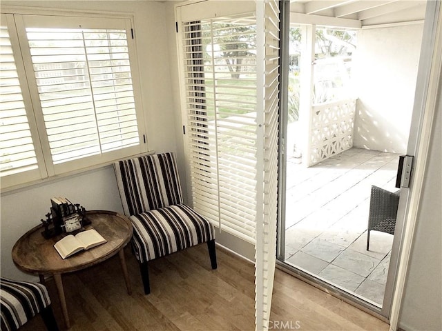 sitting room with light hardwood / wood-style floors