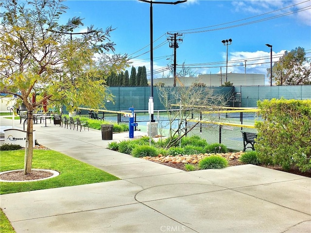 view of community with tennis court