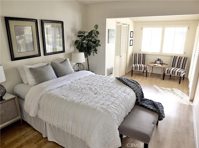 bedroom featuring wood-type flooring