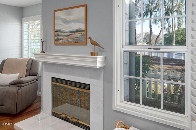 living area featuring tile patterned floors