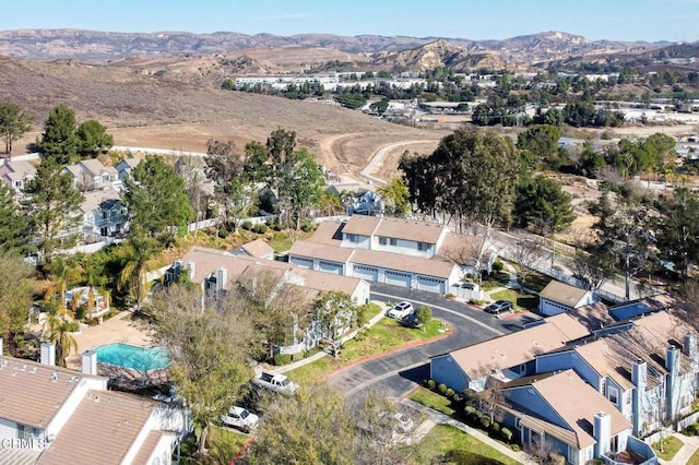 drone / aerial view featuring a mountain view