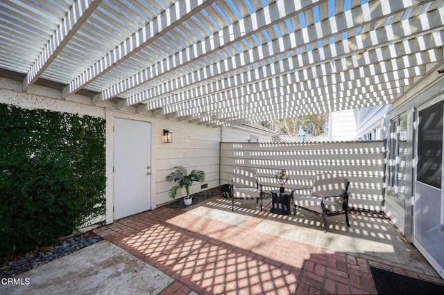 view of patio featuring a pergola