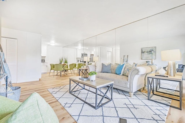 living room featuring light wood-type flooring