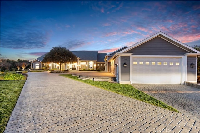 view of front of property featuring a garage