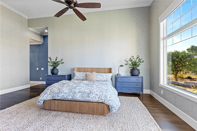 bedroom with dark hardwood / wood-style flooring, crown molding, and ceiling fan