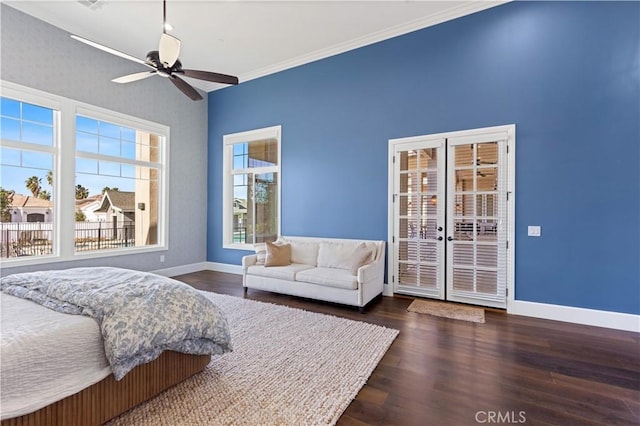 bedroom featuring dark hardwood / wood-style flooring, ornamental molding, access to outside, and ceiling fan