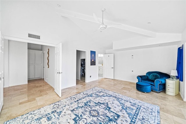 sitting room with vaulted ceiling with beams