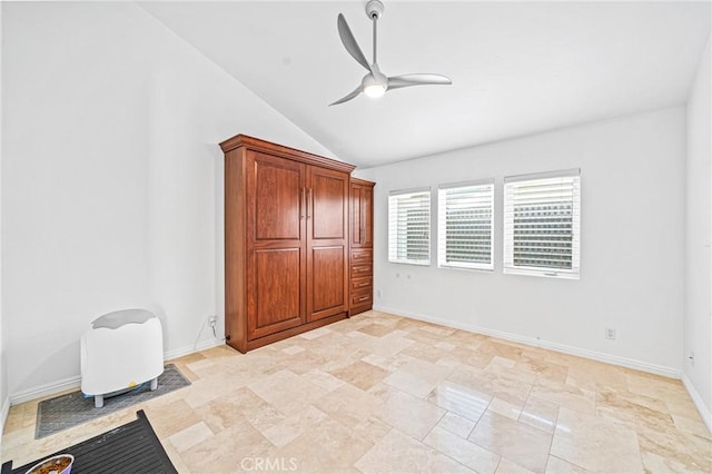 unfurnished bedroom featuring ceiling fan and vaulted ceiling