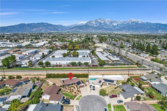 drone / aerial view featuring a mountain view and a residential view