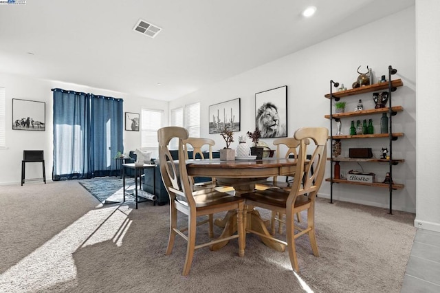 dining area with carpet