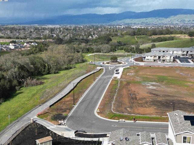 bird's eye view with a mountain view