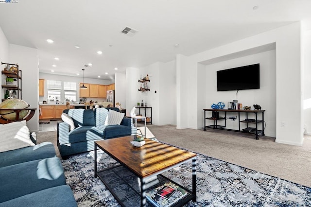 living room featuring carpet