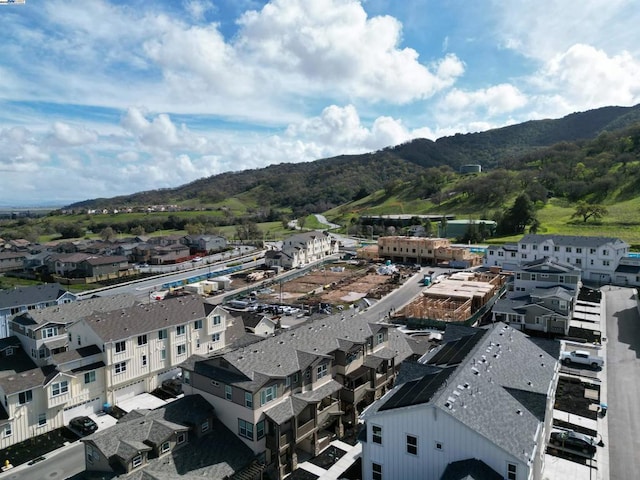 drone / aerial view featuring a mountain view