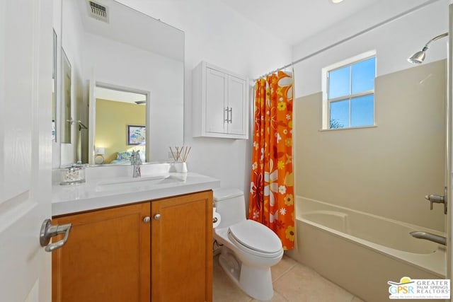 full bathroom featuring shower / bathtub combination with curtain, vanity, tile patterned floors, and toilet