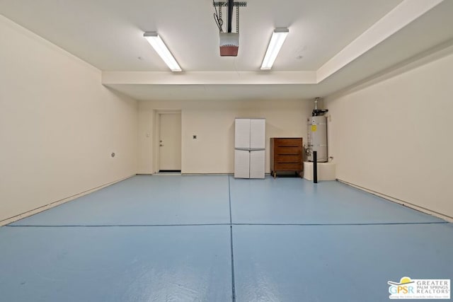 garage with a garage door opener and secured water heater