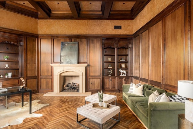 living room with coffered ceiling, a towering ceiling, parquet flooring, and beamed ceiling