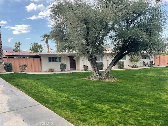 view of front of house with a front lawn