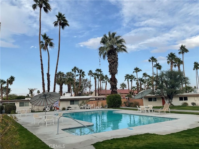 view of pool featuring a patio