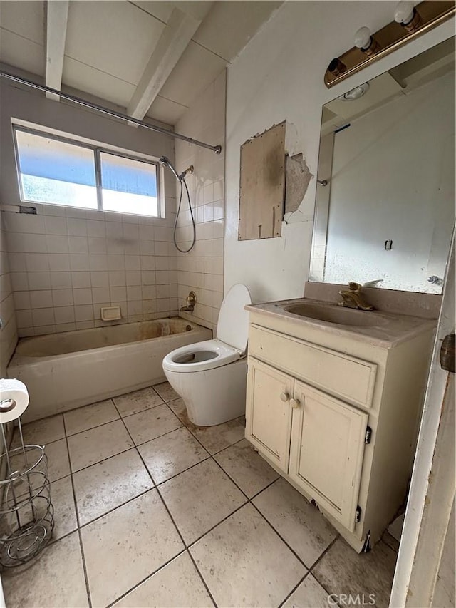 full bathroom featuring toilet, tiled shower / bath, vanity, beamed ceiling, and tile patterned flooring