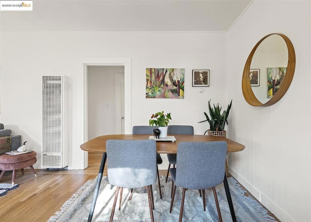 dining area with wood-type flooring