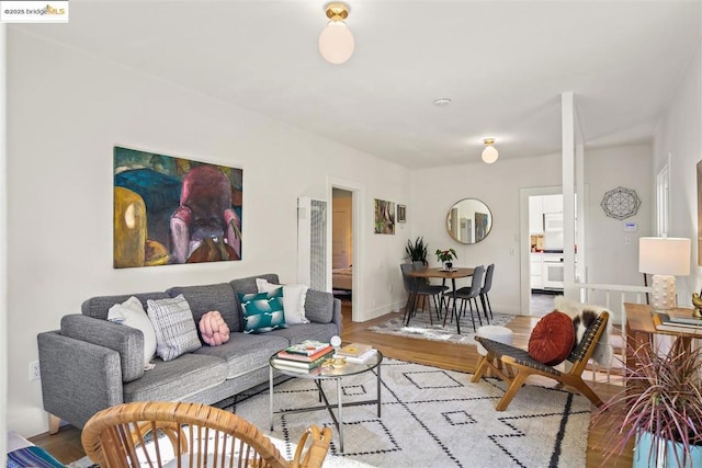 living room with light hardwood / wood-style floors