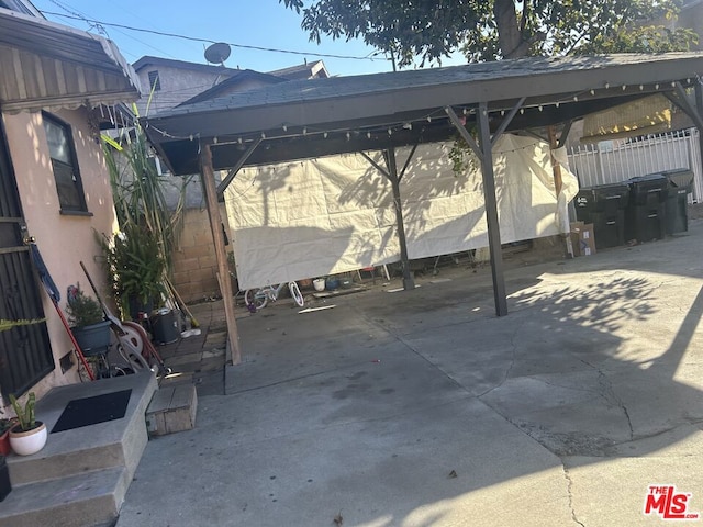 view of patio with a carport