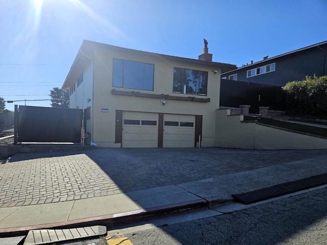 view of front of property with a garage