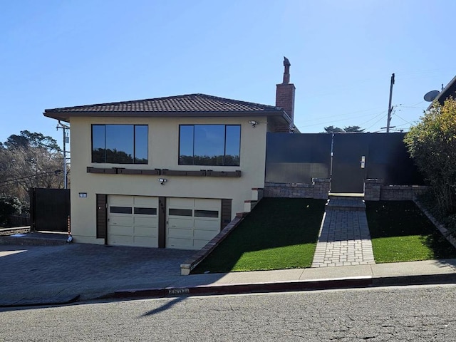 view of front of house with a garage