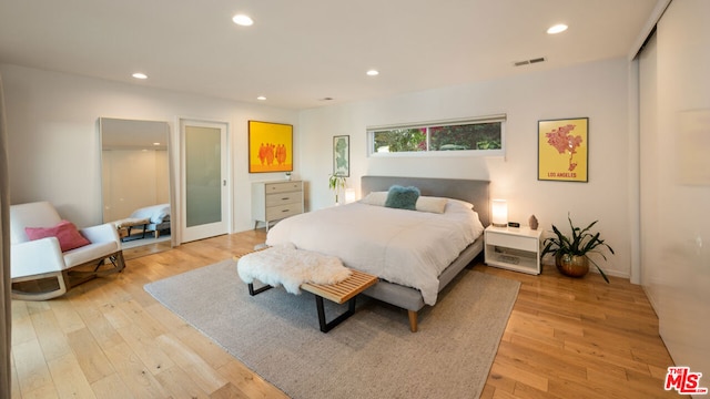 bedroom featuring light hardwood / wood-style floors