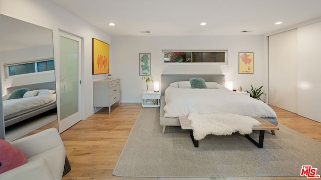 bedroom featuring light hardwood / wood-style floors