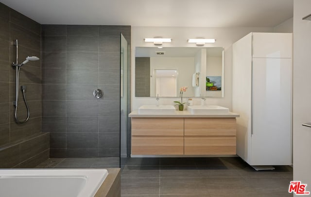 bathroom with vanity, tile patterned floors, and independent shower and bath