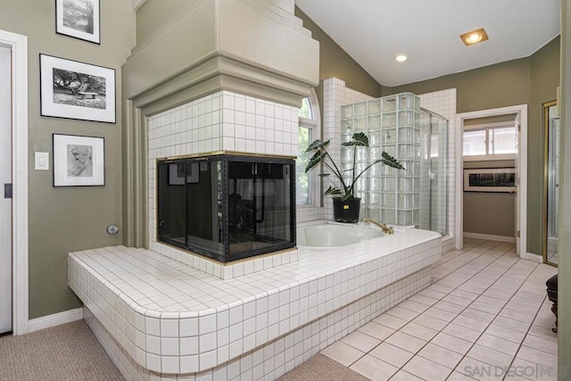 bathroom featuring tile patterned flooring and lofted ceiling