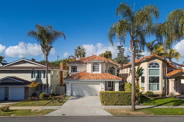 view of front of house with a garage and a front lawn