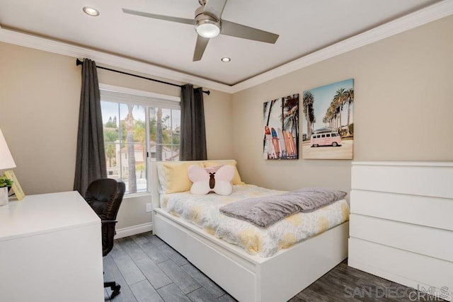 bedroom featuring dark hardwood / wood-style flooring, crown molding, and ceiling fan