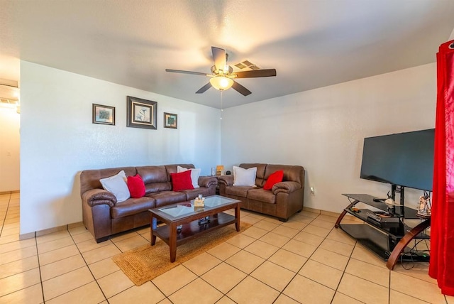 tiled living room featuring ceiling fan