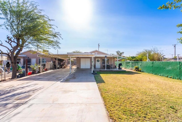 bungalow featuring a carport and a front yard