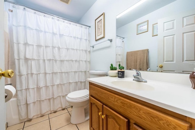 full bathroom featuring tile patterned floors, toilet, vanity, and shower / bath combo