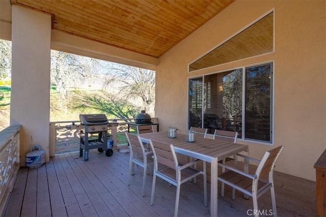 wooden deck featuring grilling area