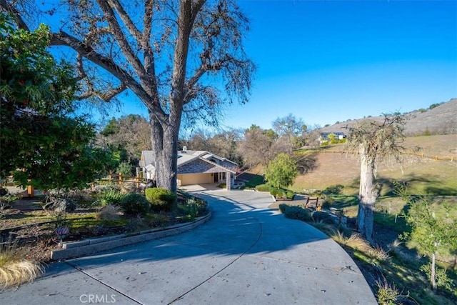 view of front of home featuring a mountain view