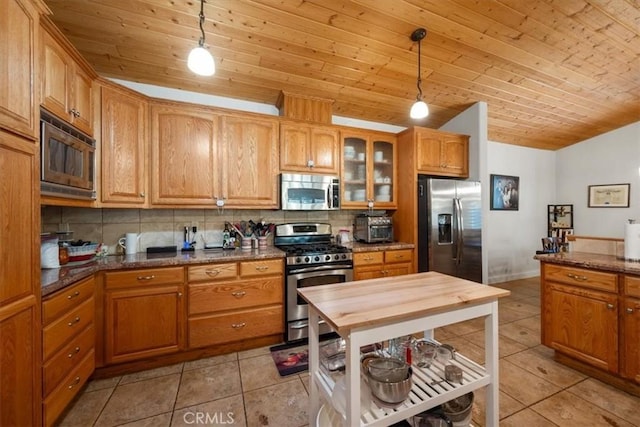 kitchen featuring wood ceiling, stainless steel appliances, and hanging light fixtures