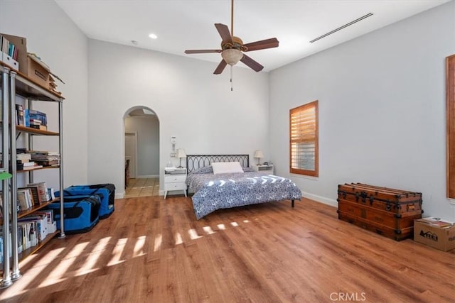 bedroom featuring ceiling fan and light wood-type flooring